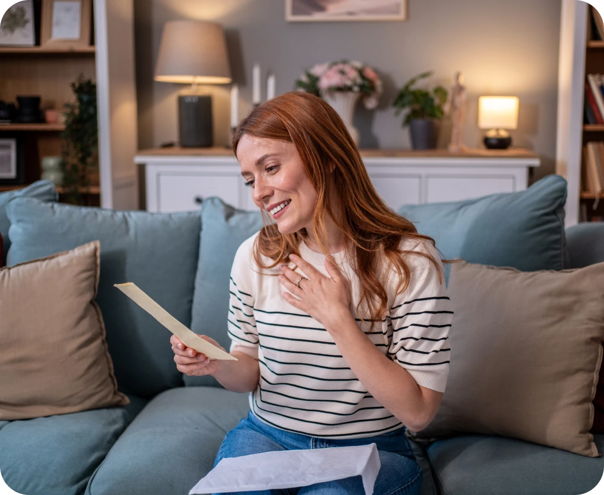 Happy woman receiving good news in letter